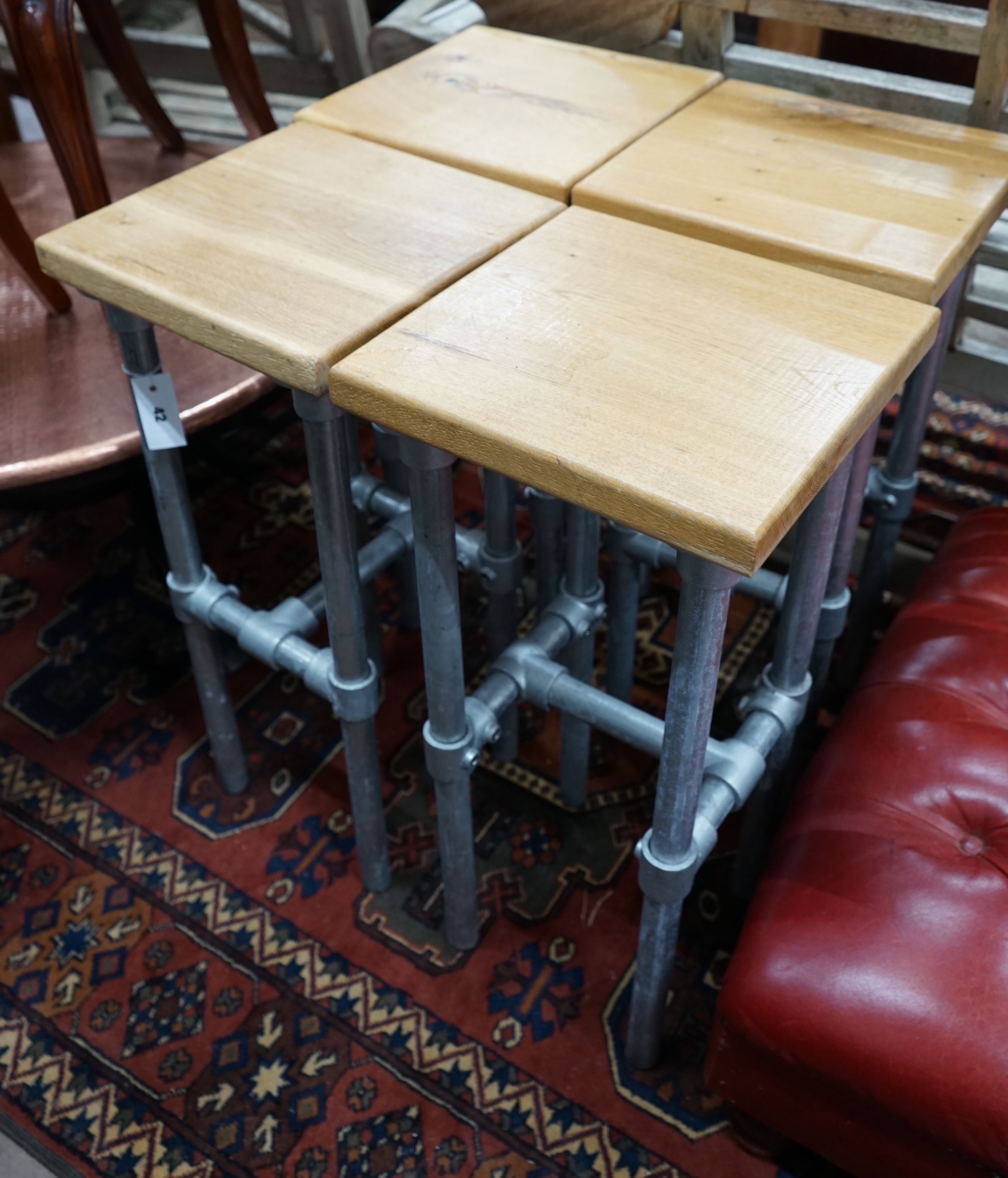 A set of four Industrial style oak and scafford pole bar stools, height 75cm
